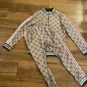 2 piece track suit, brand new never worn. Can be make or female.